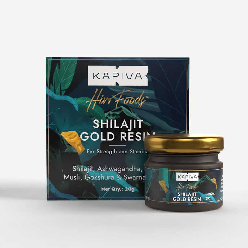Jar of shilajit resin with ashwagandha roots on linen